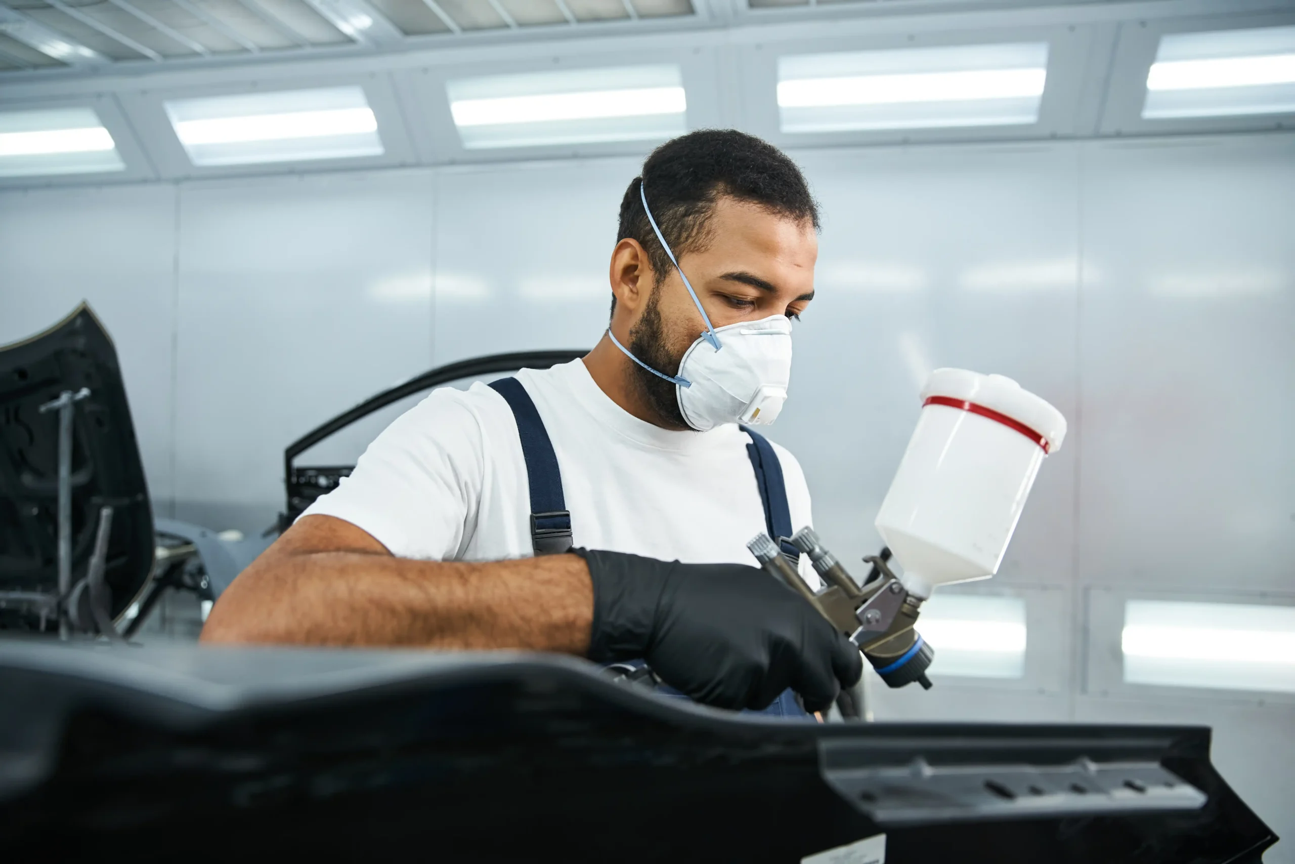 skilled young mechanic working diligently